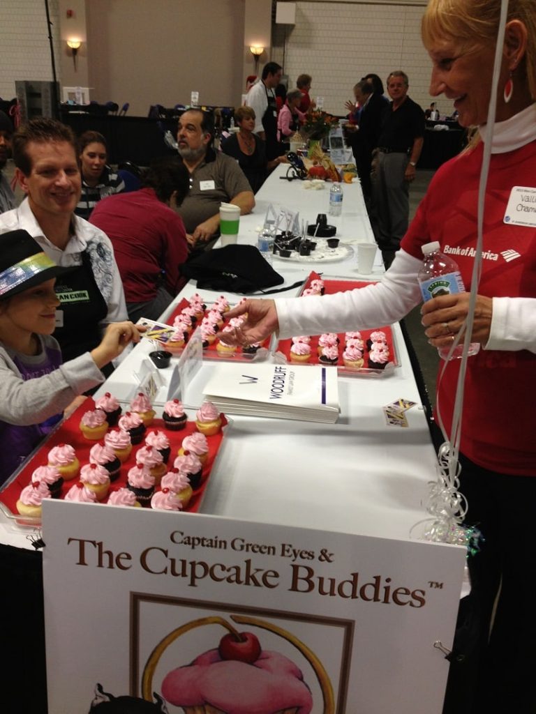 Girl Buying Cupcake